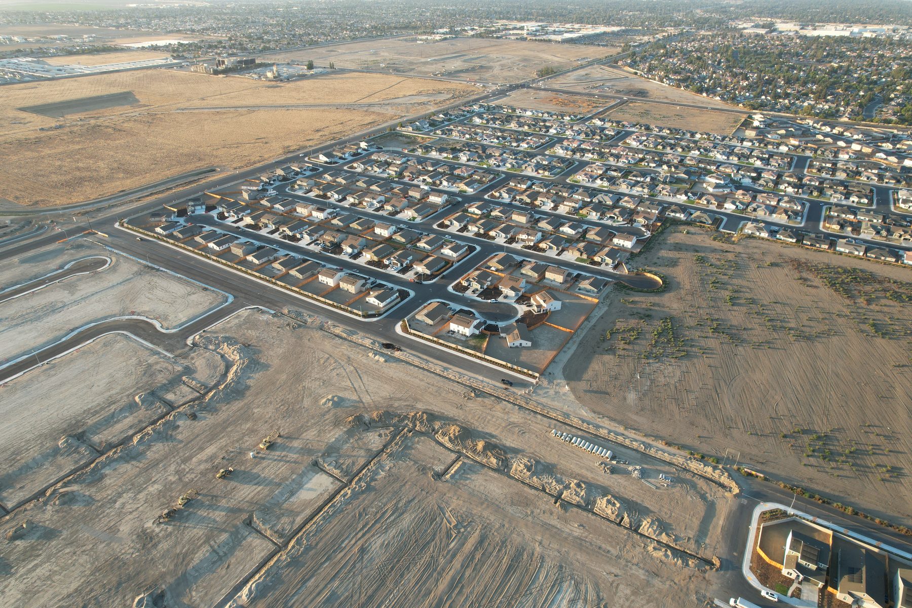 Aerial view of Sterling Manor II (Tract 7262) showing finished homes beside graded lots